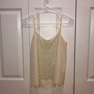 Off white tank with sheer front detailing